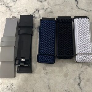 Loop stretchy blue, black, grey, white versa bands. Grey and black nylon bands